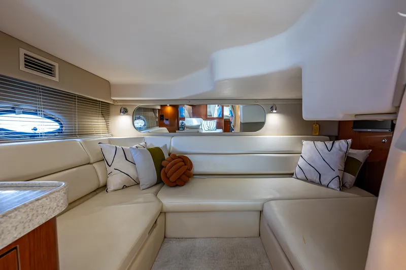  Yacht Photos Pics Luxurious interior of 2006 Regal Commodore 3560 IO yacht with plush seating and stylish decor.