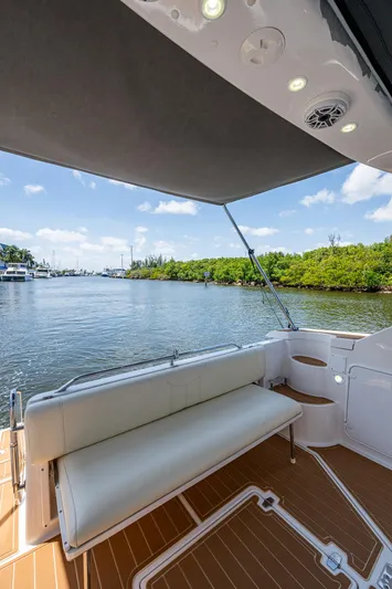  Yacht Photos Pics 2006 Regal Commodore 3560 IO boat, rear seating area with scenic water view.