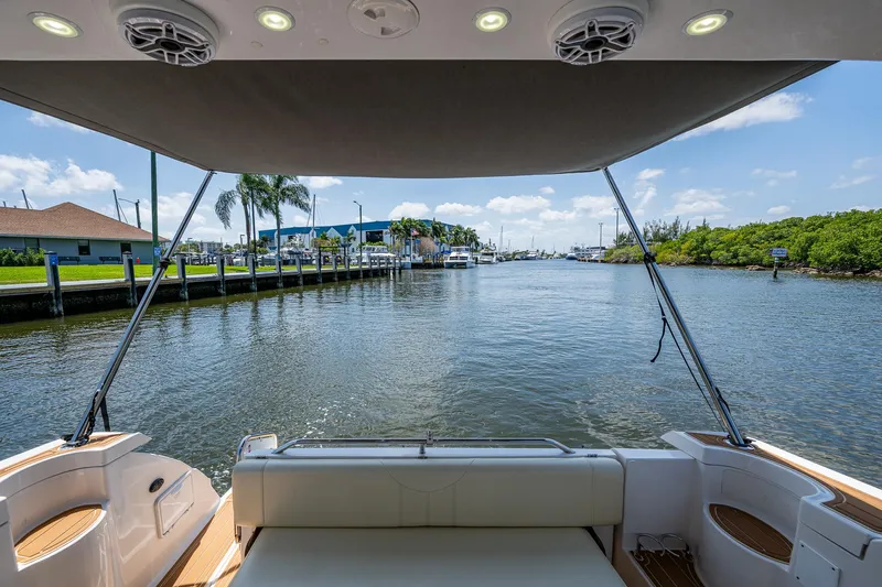  Yacht Photos Pics 2006 Regal Commodore 3560 IO boat view from deck, overlooking serene waterway.