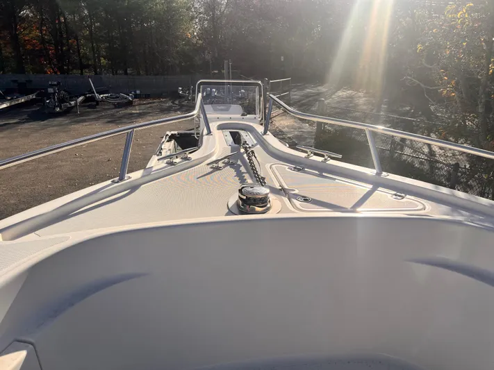  Yacht Photos Pics 2001 Pursuit 3070 Offshore Center Console boat deck in sunlight.