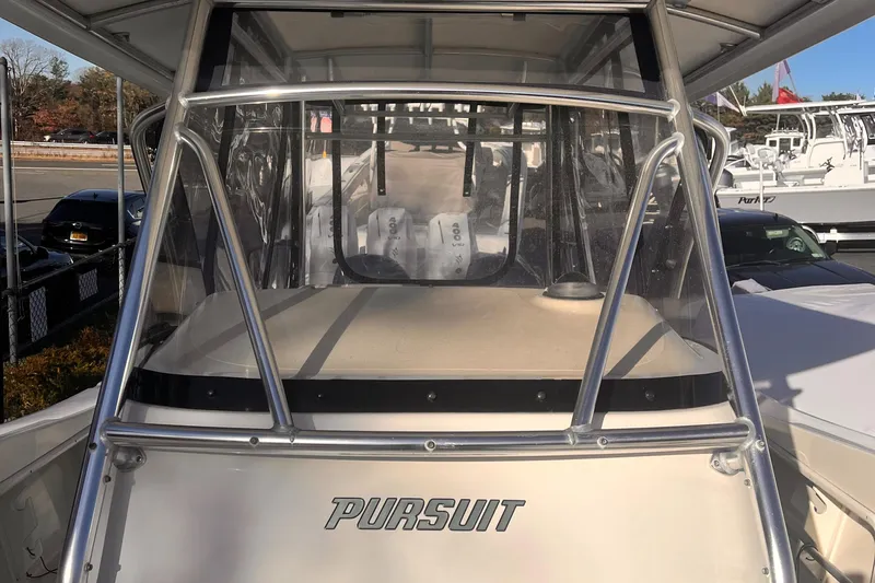  Yacht Photos Pics 2001 Pursuit 3070 Offshore Center Console boat, front view with clear windshield.