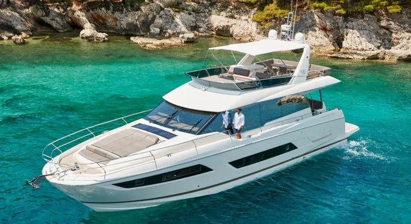  Yacht Photos Pics Luxury 2016 Prestige 680 yacht cruising in clear turquoise waters.