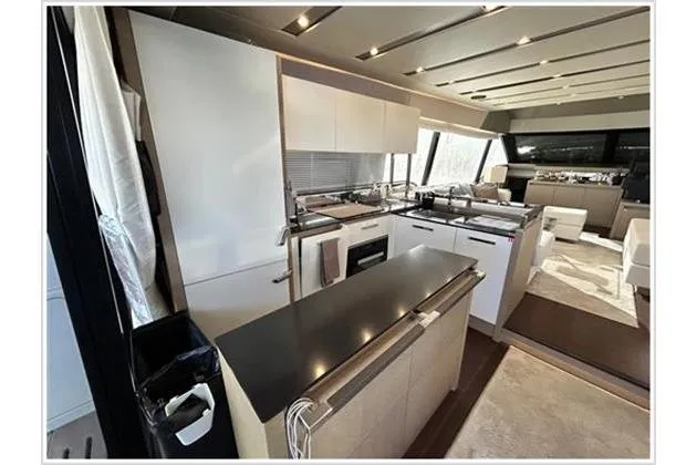  Yacht Photos Pics Luxurious kitchen interior of 2016 Prestige 680 Fly yacht with modern design and sleek finishes.