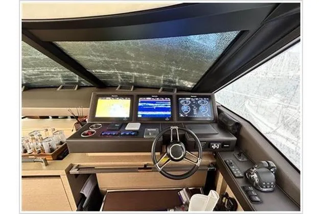  Yacht Photos Pics Cockpit of 2016 Prestige 680 Fly yacht with modern navigation equipment.