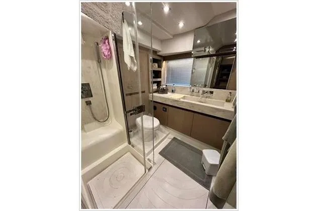  Yacht Photos Pics Luxurious bathroom in 2016 Prestige 680 Fly yacht with modern fixtures and elegant design.