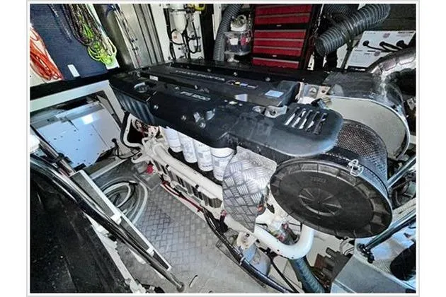  Yacht Photos Pics Engine room of 2016 Prestige 680 Fly yacht, showcasing mechanical components and systems.