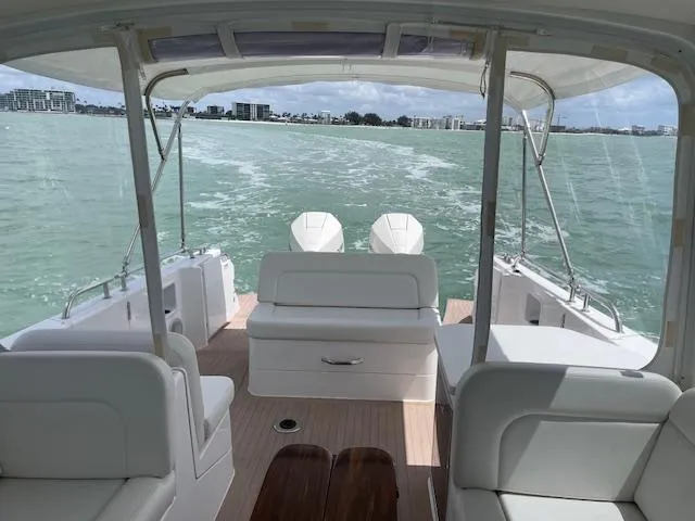  Yacht Photos Pics 2023 MJM 35z boat interior with seating, cruising on open water.