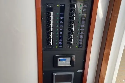  Yacht Photos Pics Electrical control panel on a 2023 MJM 35z boat, featuring switches and displays.