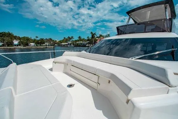  Yacht Photos Pics 2022 Ferretti Yachts 550 luxury yacht with sleek design and spacious deck.