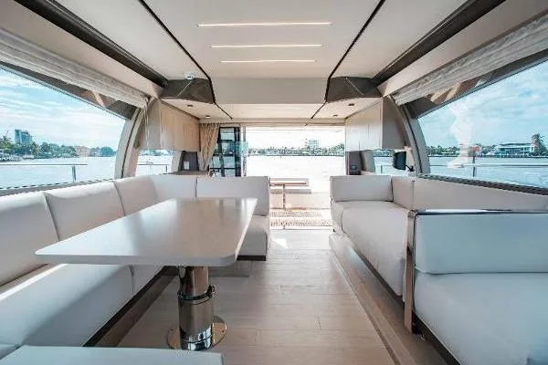  Yacht Photos Pics Luxurious interior of 2022 Ferretti Yachts 550 with elegant seating and panoramic views.
