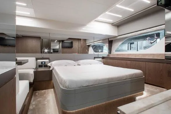  Yacht Photos Pics Luxurious interior of 2022 Ferretti Yachts 550, featuring a modern bedroom design.