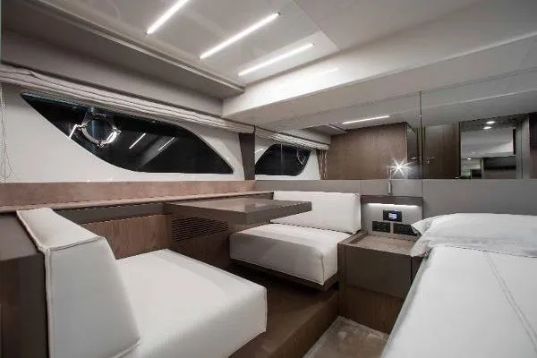 Yacht Photos Pics Luxurious interior of 2022 Ferretti Yachts 550 with modern seating and elegant design.