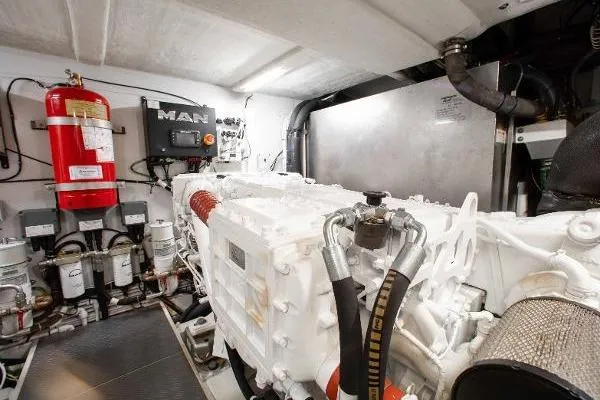  Yacht Photos Pics Engine room of 2022 Ferretti Yachts 550, featuring MAN engine and safety equipment.
