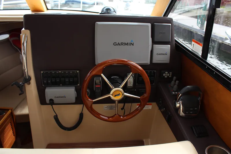 Shake N Bake Yacht Photos Pics Interior helm of 2013 Cutwater 28 LE boat with Garmin navigation system.