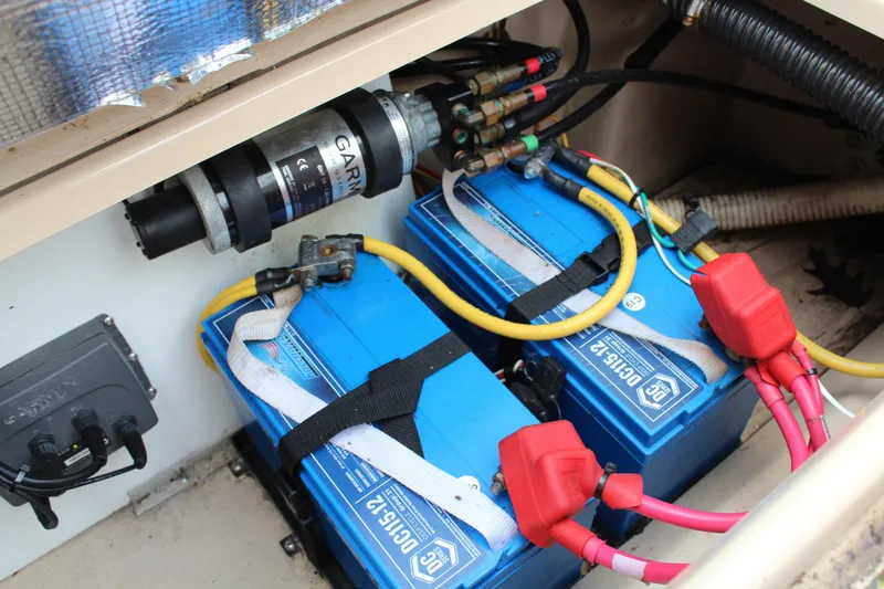 Shake N Bake Yacht Photos Pics Battery compartment of a 2013 Cutwater 28 LE boat with wiring and components.