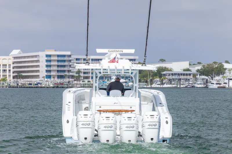  Yacht Photos Pics 2020 Yellowfin 42 Offshore boat with four 400 horsepower engines on the water.