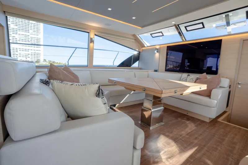  Yacht Photos Pics Luxurious interior of 2025 Aquila 54 Yacht with elegant seating and modern design.