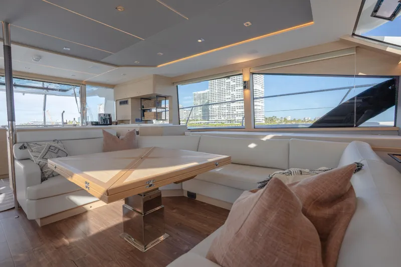  Yacht Photos Pics Luxurious interior of 2025 Aquila 54 Yacht with elegant seating and modern design.