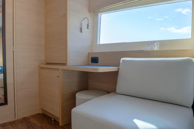  Yacht Photos Pics Interior of 2025 Aquila 54 Yacht with modern seating and natural light.