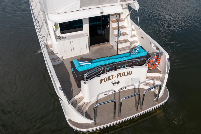  Yacht Photos Pics 2007 Ocean Alexander 52 Pilothouse yacht with spacious deck and seating area.