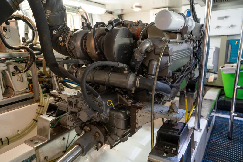  Yacht Photos Pics Engine room of 2007 Ocean Alexander 52 Pilothouse yacht, showcasing complex machinery and components.