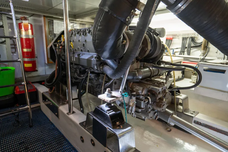  Yacht Photos Pics Engine room of 2007 Ocean Alexander 52 Pilothouse yacht, showcasing machinery and equipment.