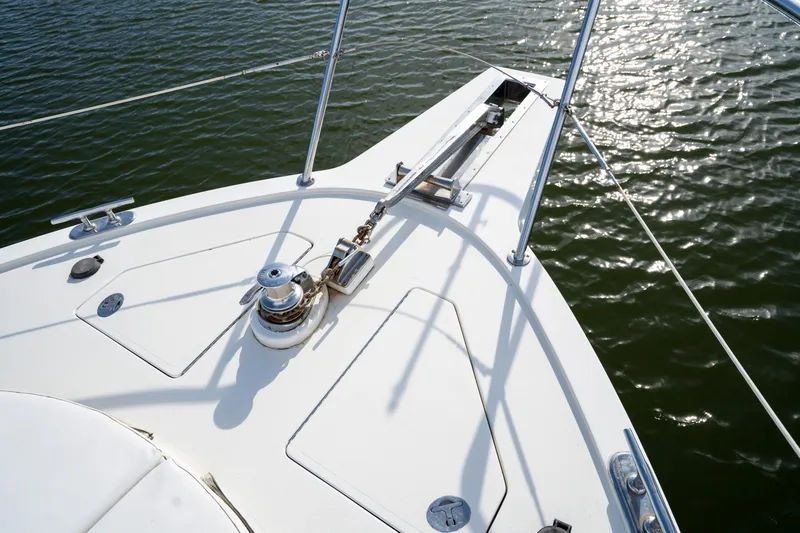  Yacht Photos Pics Bow of 2007 Ocean Alexander 52 Pilothouse yacht on calm water.