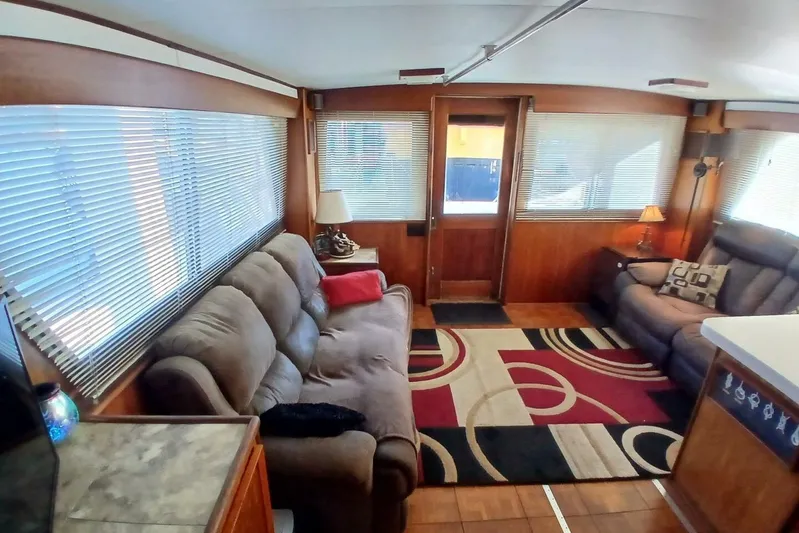 Concrete Idea Yacht Photos Pics Interior of 1977 Hatteras 48 Long Range Cruiser with cozy seating and modern decor.