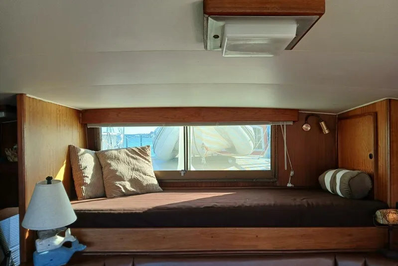 Concrete Idea Yacht Photos Pics Cozy cabin interior of 1977 Hatteras 48 Long Range Cruiser with window view.