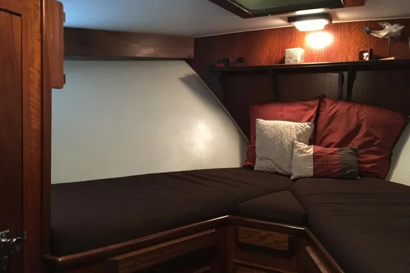 Concrete Idea Yacht Photos Pics Cozy cabin interior of 1977 Hatteras 48 Long Range Cruiser with plush bedding.