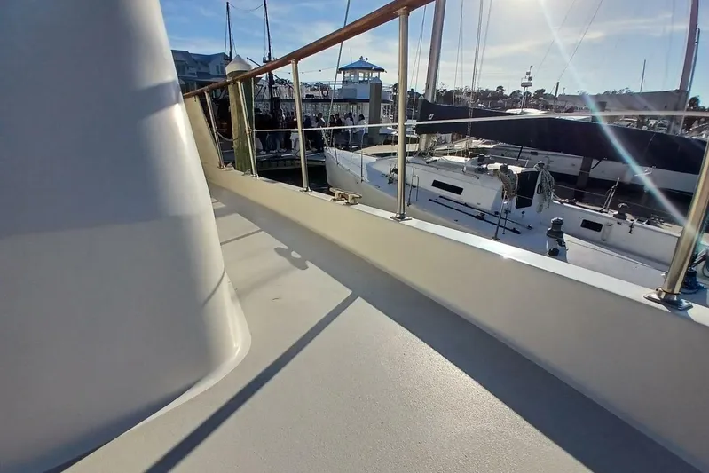 Concrete Idea Yacht Photos Pics 1977 Hatteras 48 Long Range Cruiser deck view at marina with sailboats.