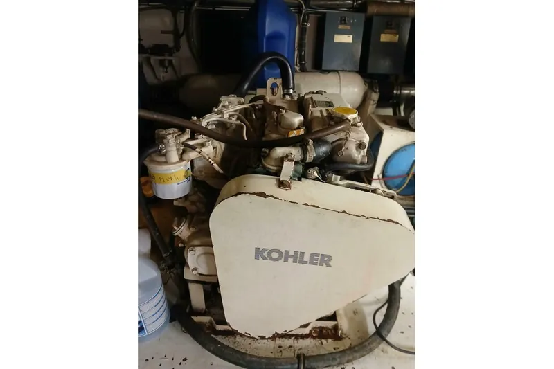 Concrete Idea Yacht Photos Pics Engine room of 1977 Hatteras 48 Long Range Cruiser with Kohler generator.