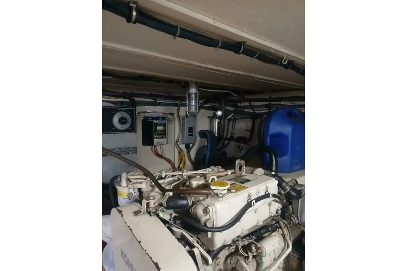 Concrete Idea Yacht Photos Pics Engine room of 1977 Hatteras 48 Long Range Cruiser with visible machinery and wiring.
