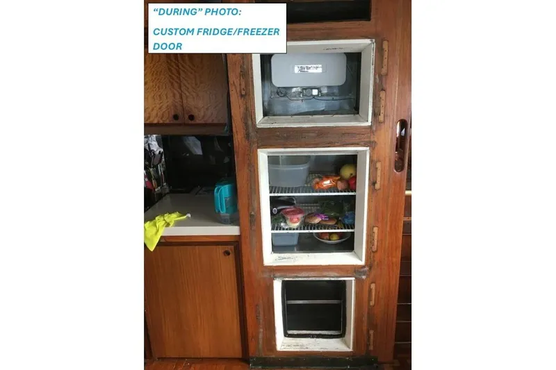 Concrete Idea Yacht Photos Pics 1977 Hatteras 48 Long Range Cruiser custom fridge/freezer door with wooden finish.