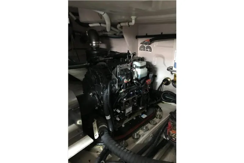 Ocean Blue III Yacht Photos Pics Engine room of 2010 Sea Ray Sundancer 540 yacht, showcasing mechanical components.