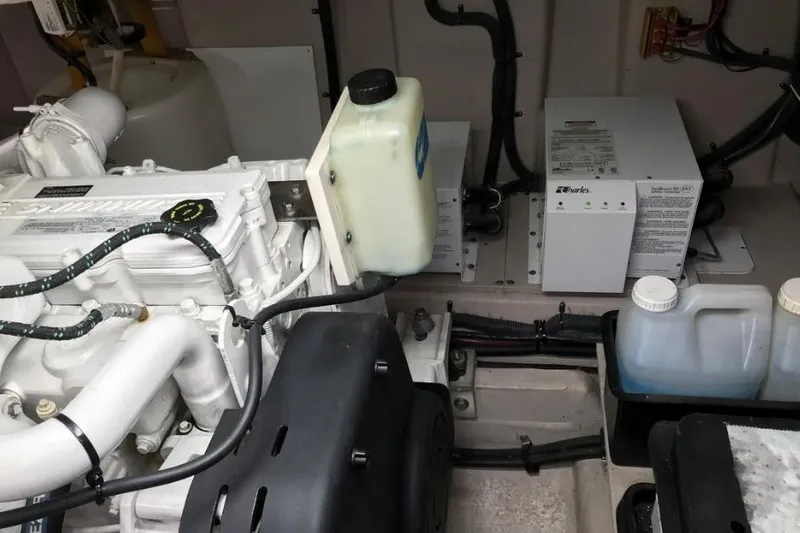 Ocean Blue III Yacht Photos Pics Engine room of 2010 Sea Ray Sundancer 540 with visible components and wiring.