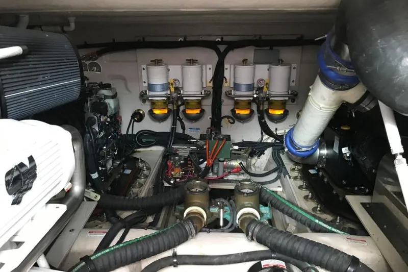 Ocean Blue III Yacht Photos Pics Engine room of 2010 Sea Ray Sundancer 540 with visible components and wiring.