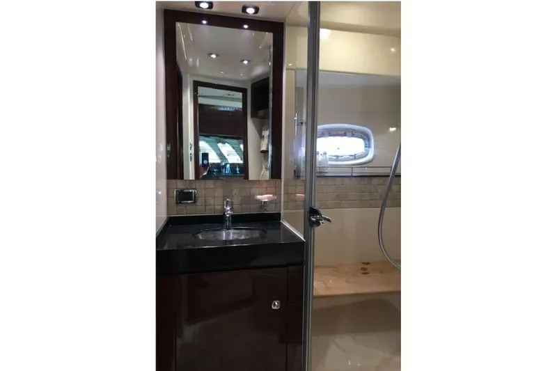 Ocean Blue III Yacht Photos Pics Luxurious bathroom in 2010 Sea Ray Sundancer 540 yacht with modern fixtures.