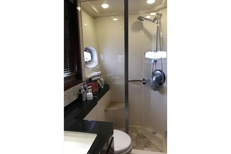 Ocean Blue III Yacht Photos Pics Luxurious bathroom in 2010 Sea Ray Sundancer 540 yacht with shower and modern amenities.