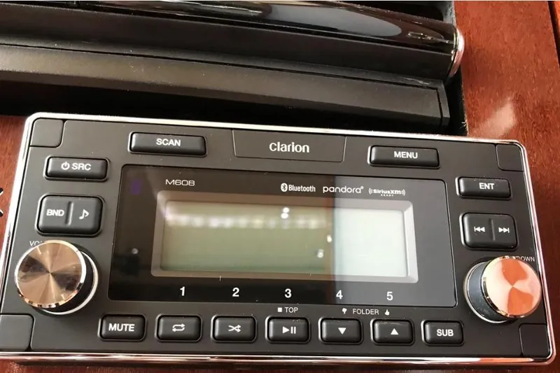 Ocean Blue III Yacht Photos Pics Clarion M608 stereo system on 2010 Sea Ray Sundancer 540 yacht dashboard.