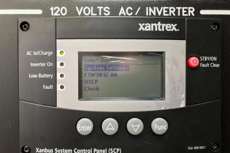 Ocean Blue III Yacht Photos Pics Xantrex inverter control panel on 2010 Sea Ray Sundancer 540 yacht, displaying system settings.