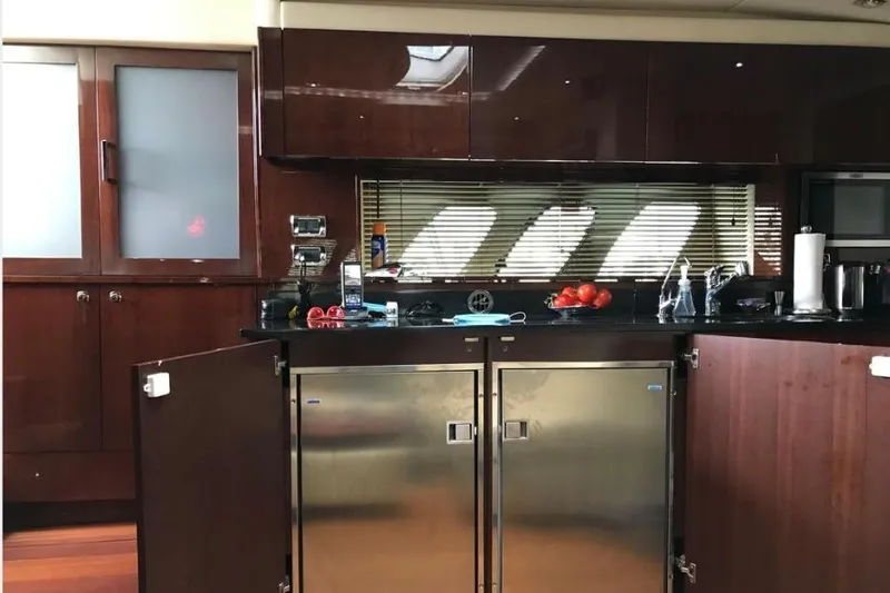 Ocean Blue III Yacht Photos Pics Luxurious kitchen interior of 2010 Sea Ray Sundancer 540 yacht with modern amenities.