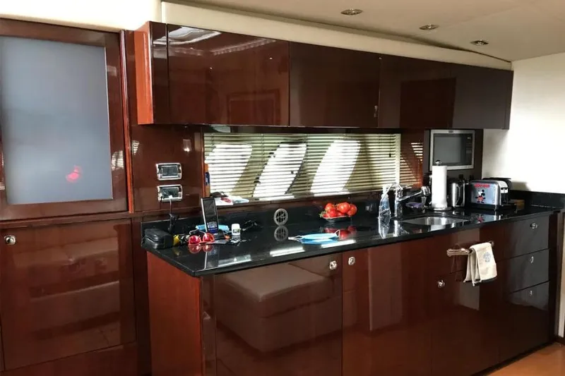 Ocean Blue III Yacht Photos Pics Luxurious kitchen interior of 2010 Sea Ray Sundancer 540 yacht with modern amenities.