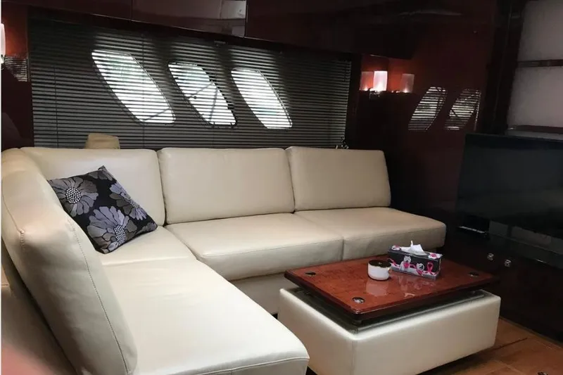 Ocean Blue III Yacht Photos Pics Luxurious interior of 2010 Sea Ray Sundancer 540 yacht with cream leather sofa.