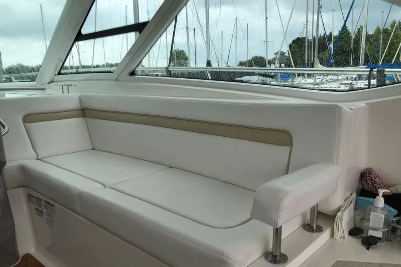 Ocean Blue III Yacht Photos Pics Interior seating of 2010 Sea Ray Sundancer 540 yacht, with marina view.