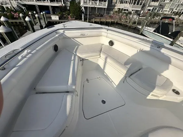  Yacht Photos Pics 2016 Boston Whaler 350 Outrage boat interior with spacious seating and storage.
