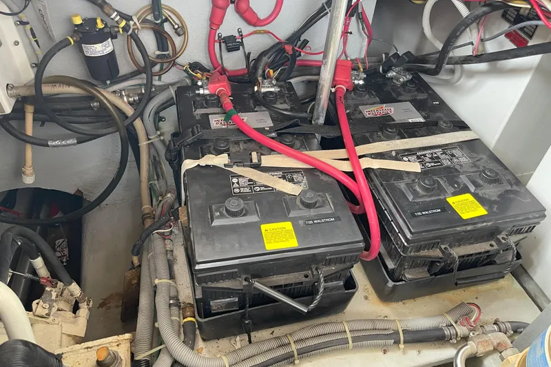  Yacht Photos Pics Engine room of 2000 Mainship 390 Trawler with batteries and wiring.