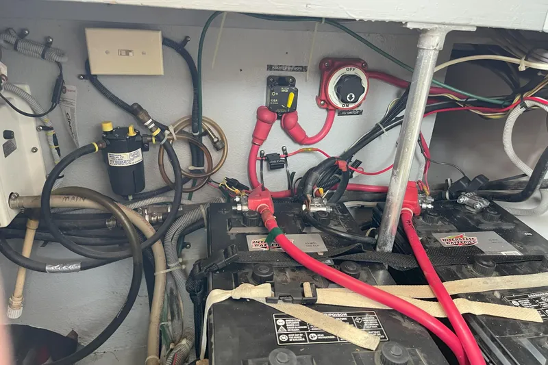  Yacht Photos Pics Engine compartment of a 2000 Mainship 390 Trawler with batteries and wiring.