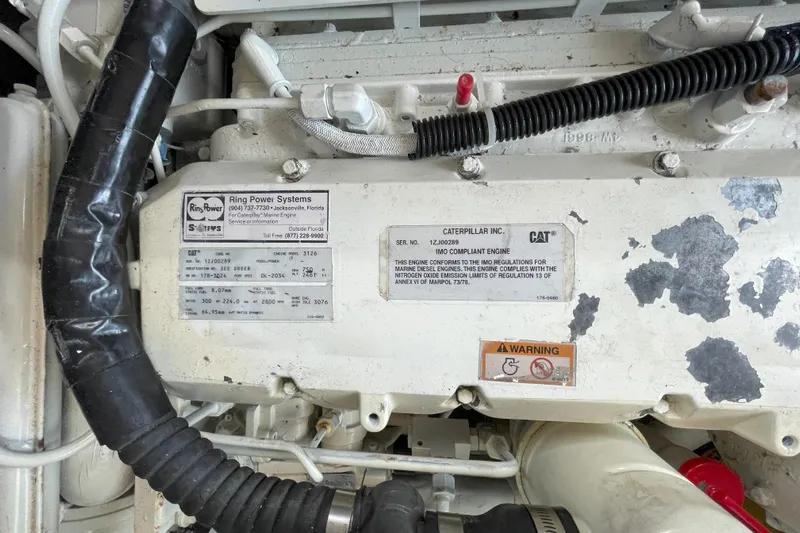  Yacht Photos Pics Engine compartment of a 2000 Mainship 390 Trawler with Caterpillar marine engine.