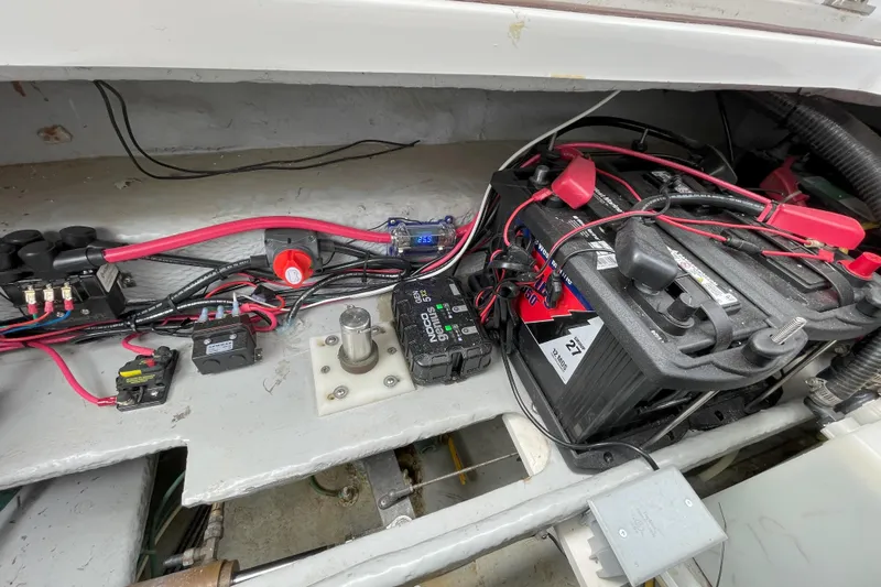  Yacht Photos Pics Battery compartment of a 2000 Mainship 390 Trawler with wiring and connections.